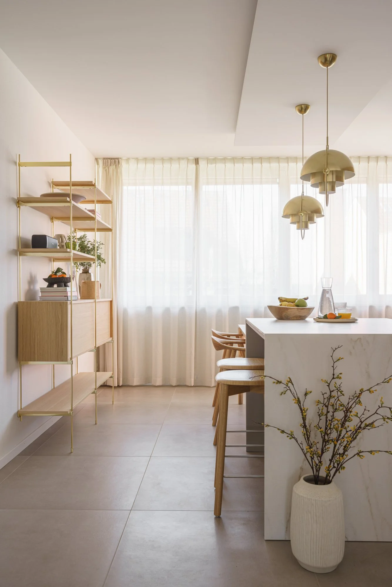 Soft and timeless kitchen design from Maison Modern in Basel-Landschaft — a modern apartment remodel by Lifestyle Si.