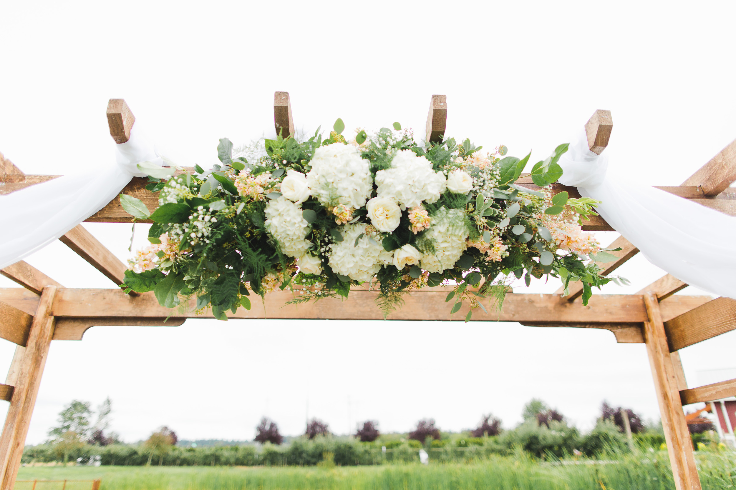 Wedding Arbor Flowers | Blush Wedding Flowers | Swans Trail Farm Snohomish Wedding | Snohomish Wedding Planner | Seattle Wedding Planner