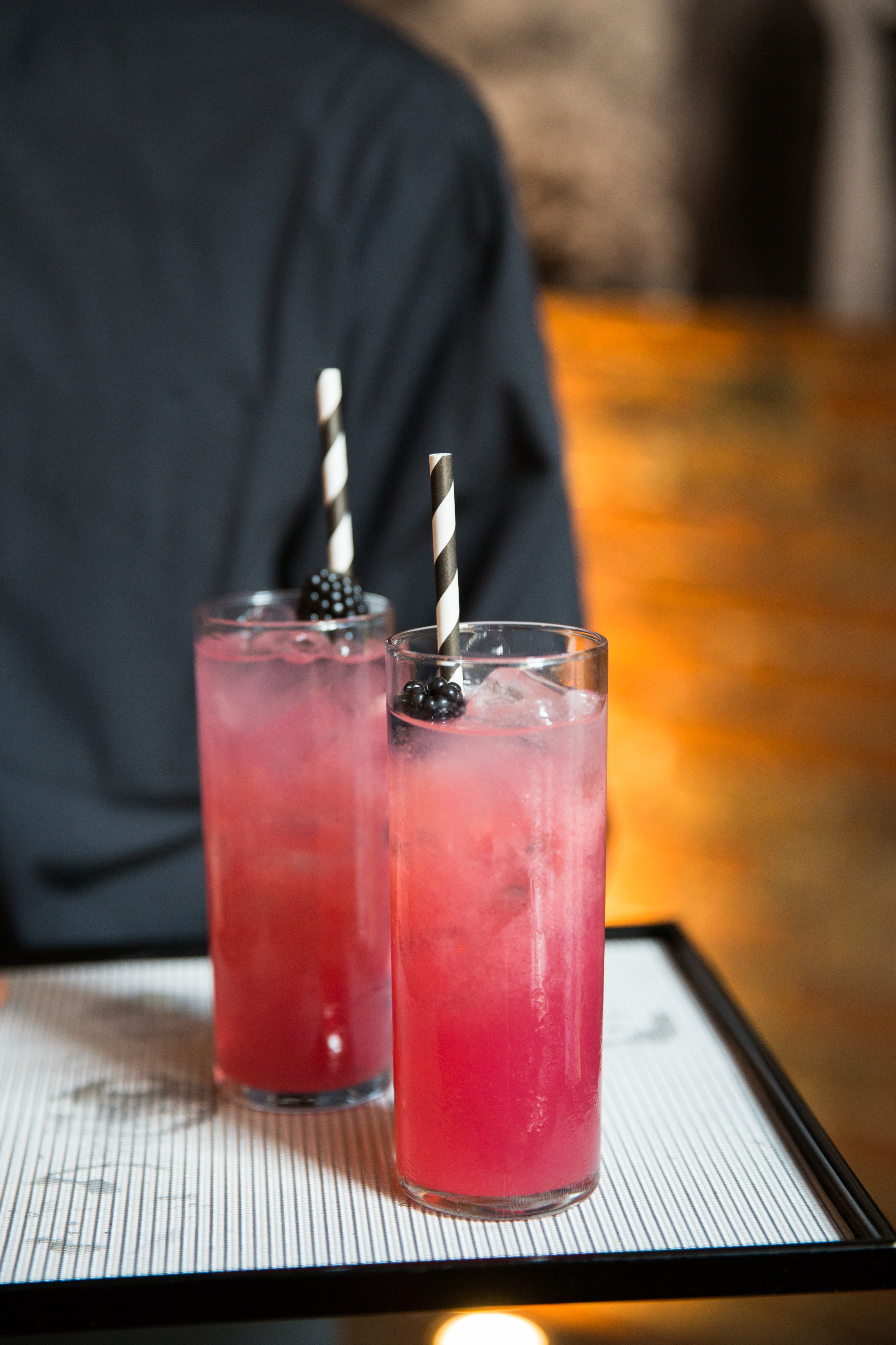 Signature Wedding Cocktail | Black and White Striped Straws | Pink Wedding Cocktail | Axis Pioneer Square Wedding | Angel and Evan Photography | Seattle Wedding Planner