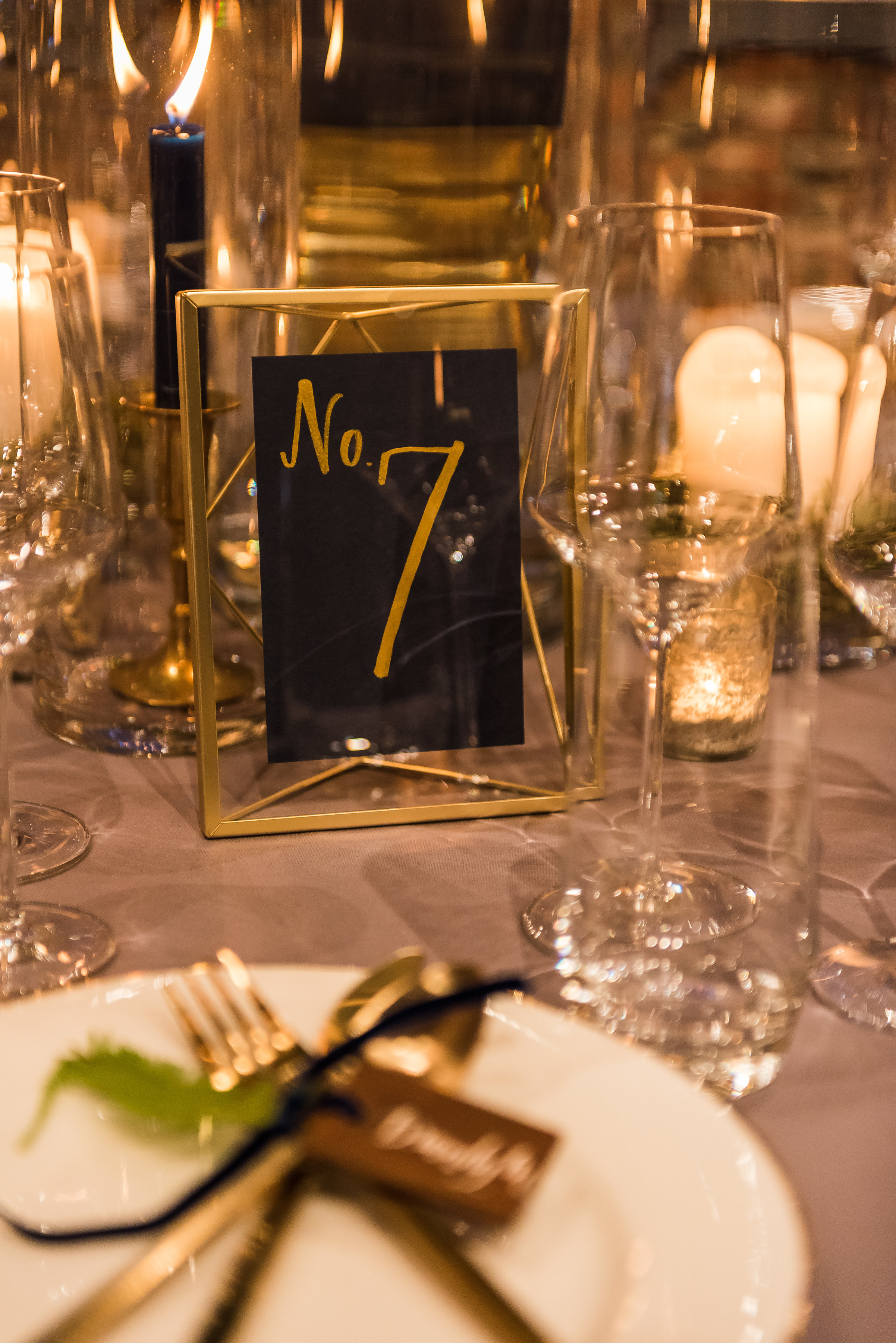 Modern gold table numbers wedding.jpg