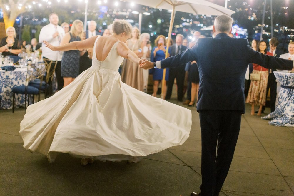 Dancing with a Twirl at Seattle Wedding Reception at Dockside at Duke's