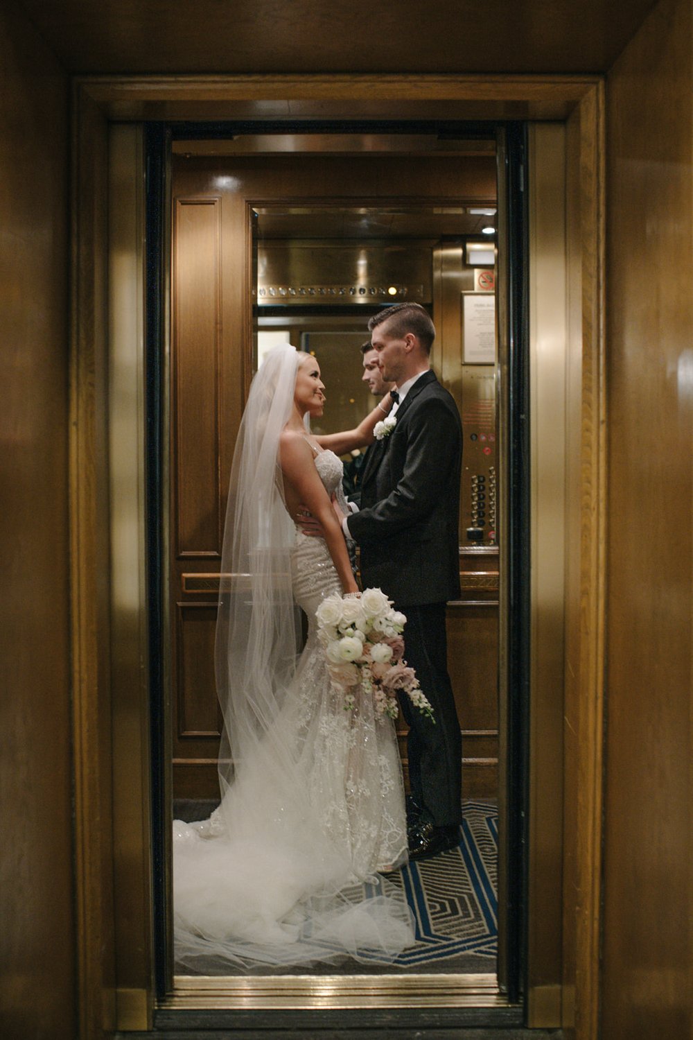 Elevator Going Away Photo at Fairmont Olympic Wedding