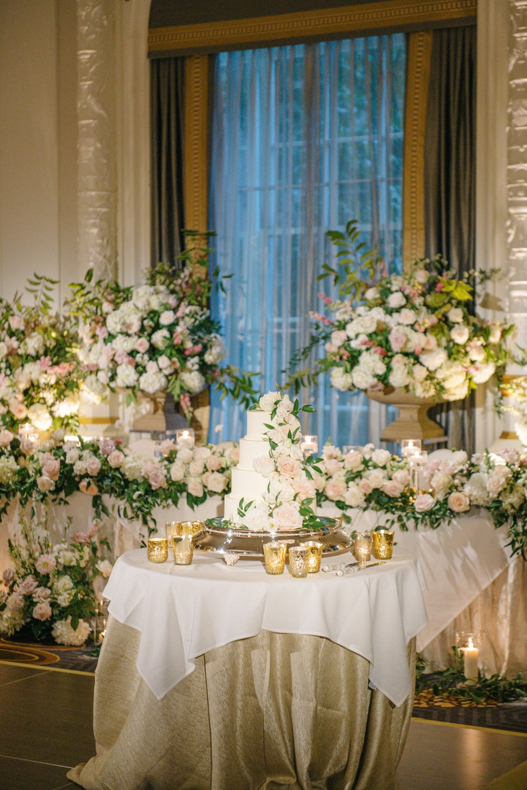 White Round Classic Wedding Cake with Blush and White Floral