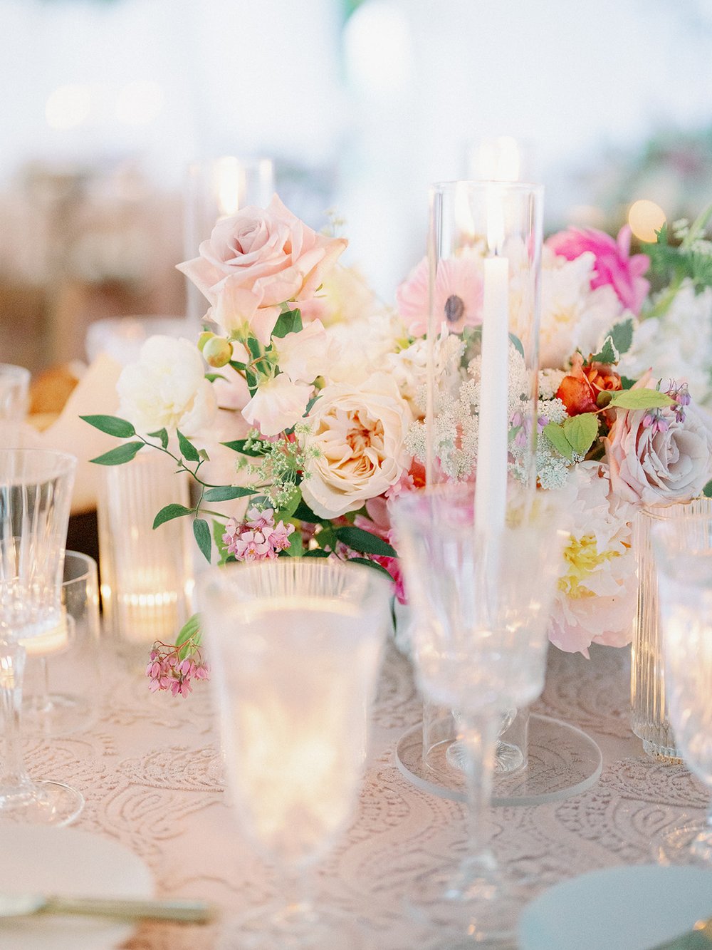 Romantic blush and ivory wedding centerpiece