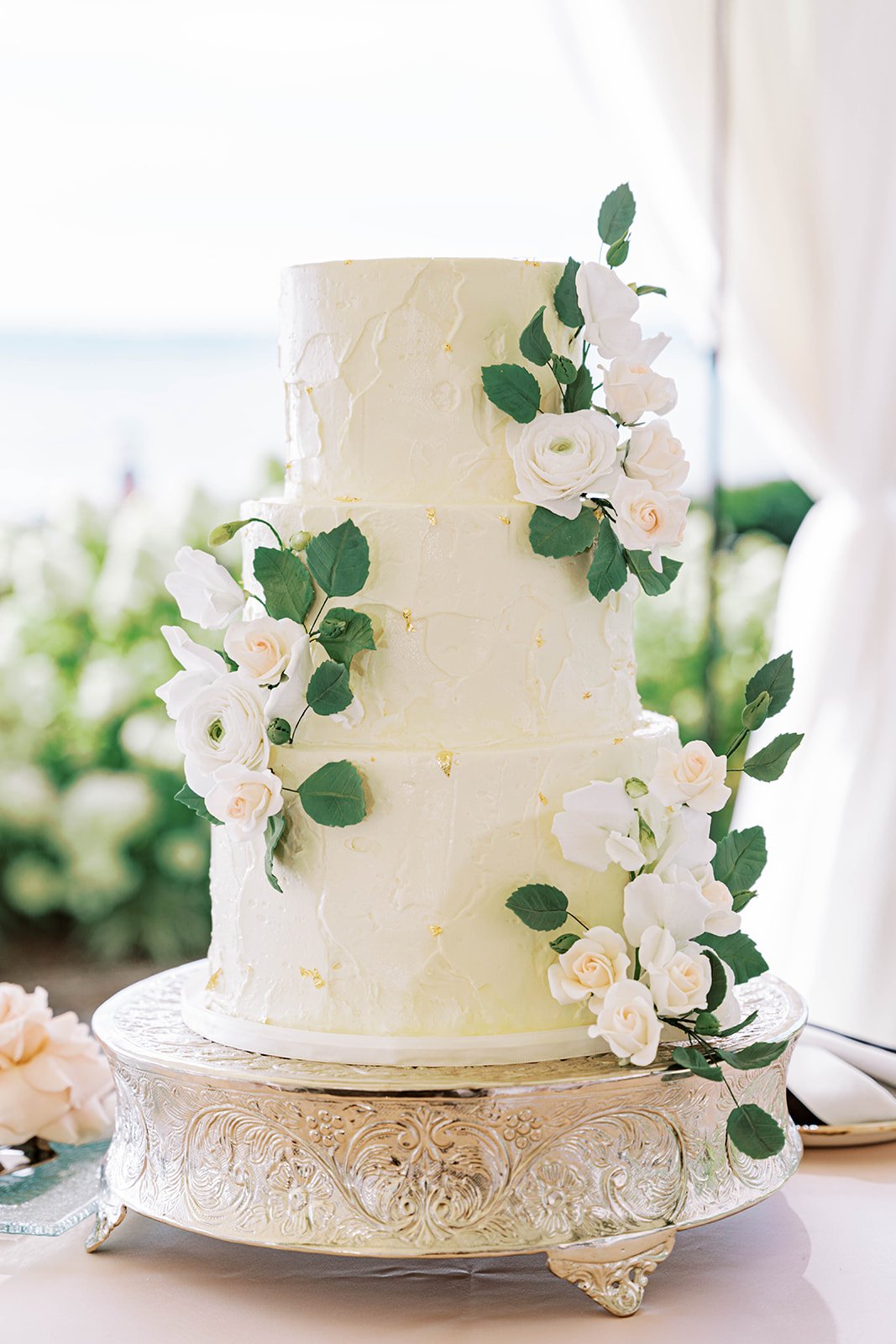 Classic Stucco Wedding Cake with White and Green Sugar Flowers at Woodmark Hotel Wedding