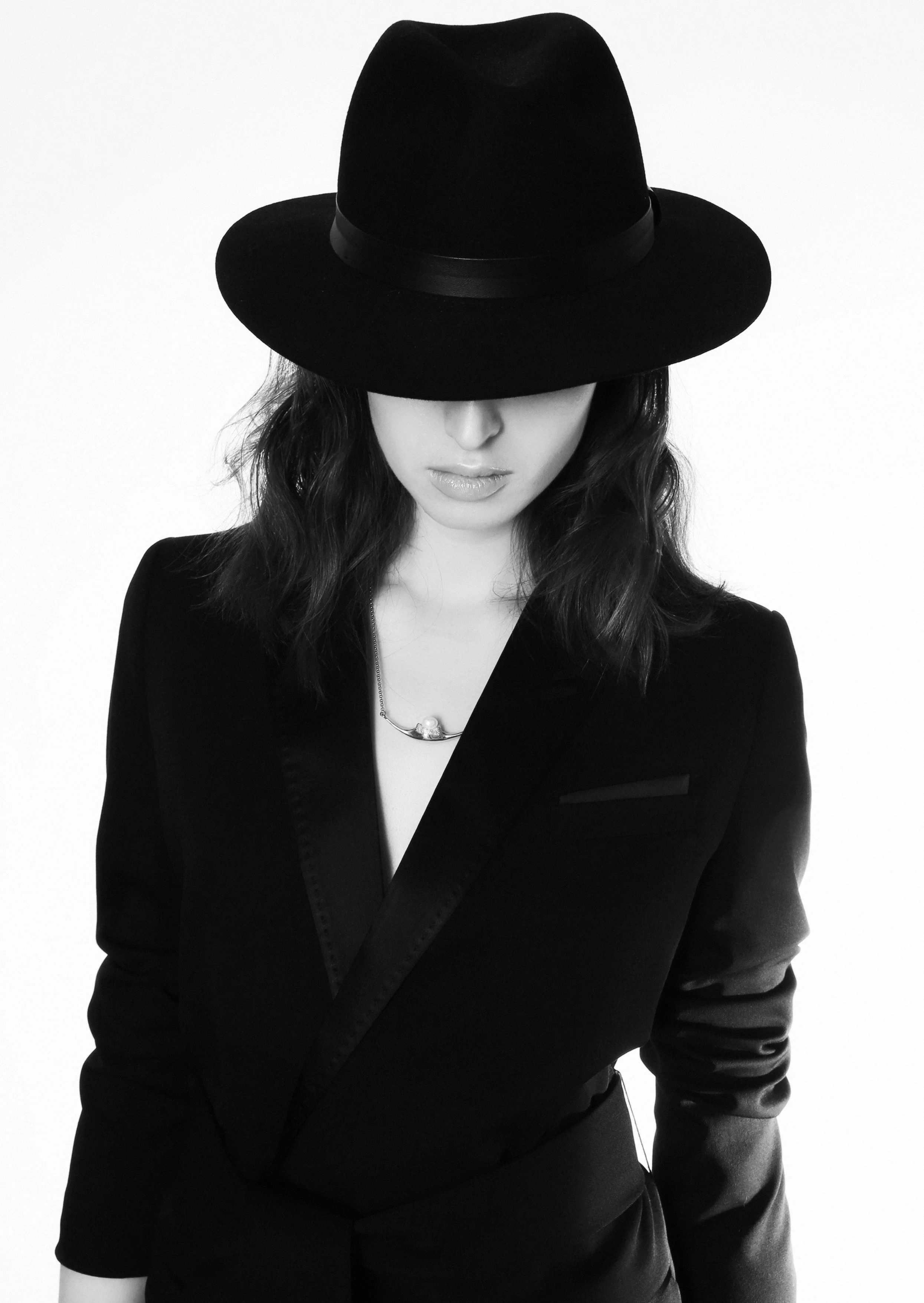 Hat, stylist's own, belted suit jacket with satin details, the Kooples, necklace, Antipearle