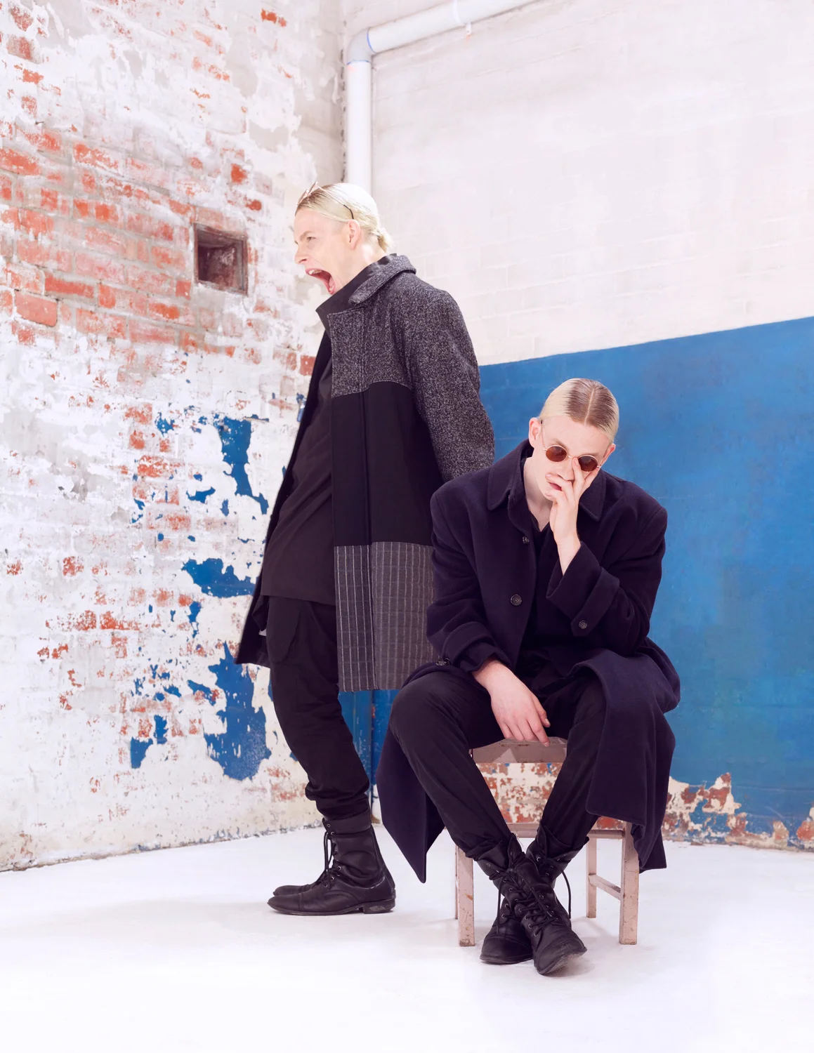 On the left: Jacket GENERAL IDEA, Pants RICK OWENS, Boots HUGO BOSS On the right: Jacket COMME DES GARCON, Pants RICK OWENS, Boots HUGO BOSS, Glasses ARMANI