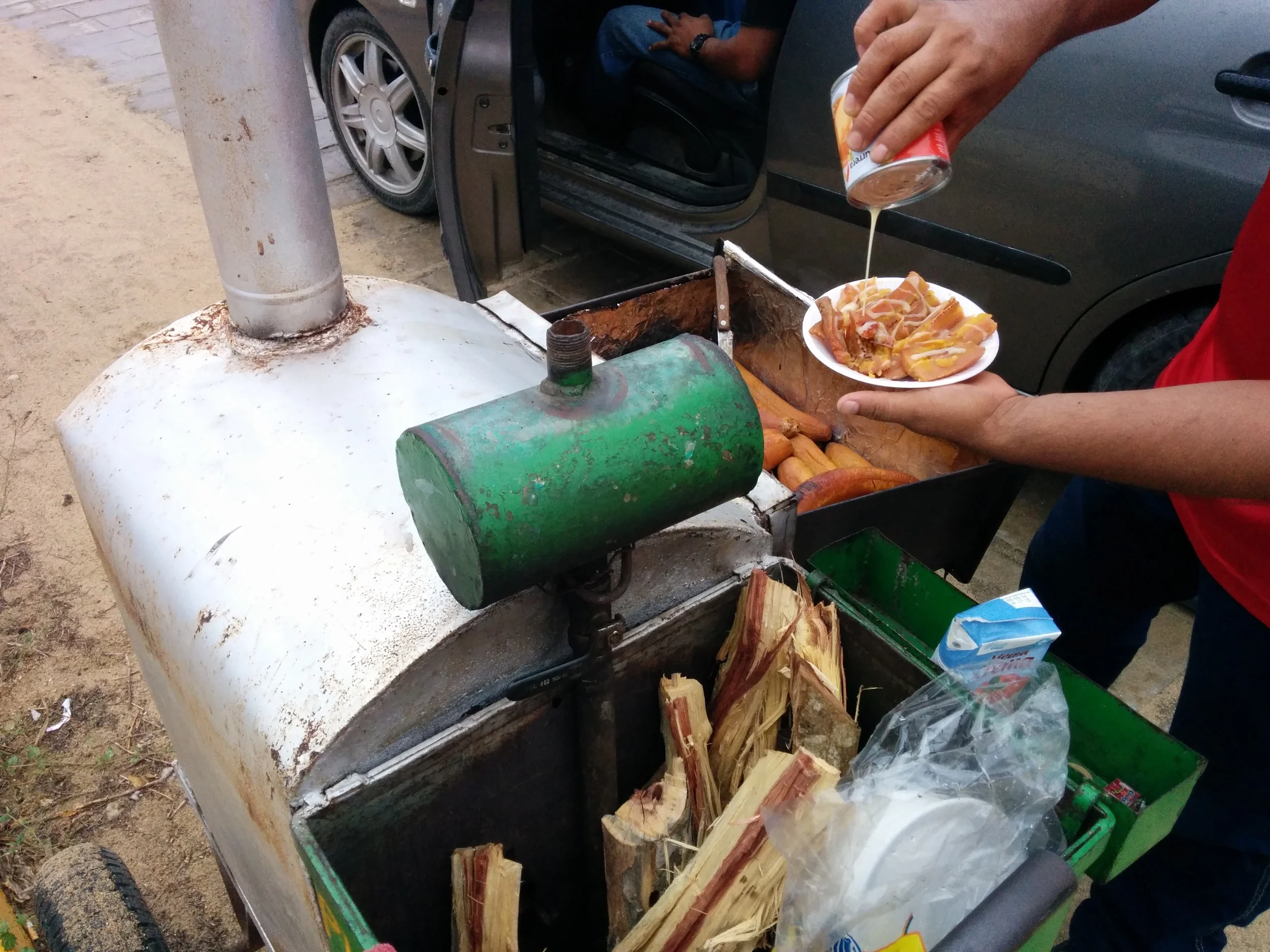 Wood fired plantain stand that rolls up and down Zicatela. Topped with condensed milk AND cream. 