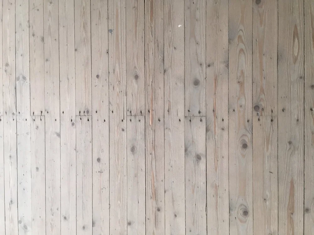 The oak floor is simply nailed into the structure without much fuss over fit and finish