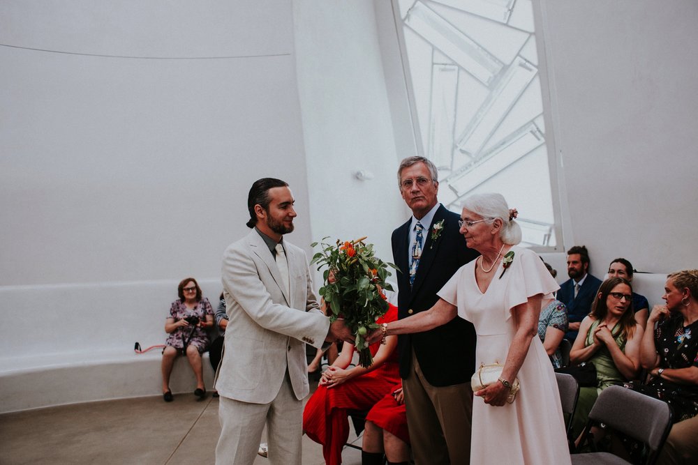  The wedding ceremony was beautifully unique and rich in emotion. There was a period of silence which allowed guests to speak or sing to Lea + Adam. They combined beautiful moments along with beautifully diverse cultural traditions - Quaker, Buddhist