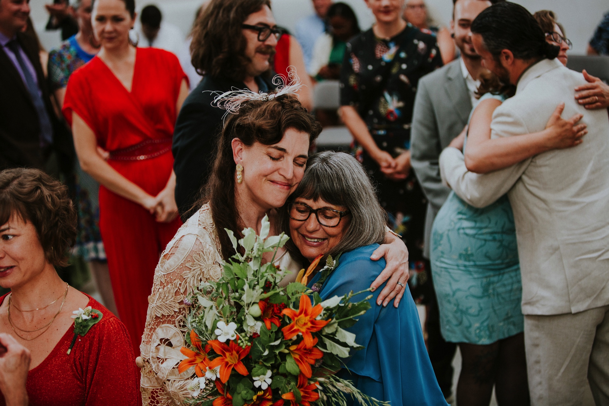  The wedding ceremony was beautifully unique and rich in emotion. There was a period of silence which allowed guests to speak or sing to Lea + Adam. They combined beautiful moments along with beautifully diverse cultural traditions - Quaker, Buddhist