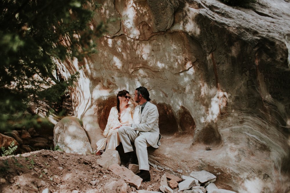  They arrived by rainbow procession from the river to their gorgeous wedding reception. They made cups for everyone with an image from a note one of them left for the other early in their relationship that has become a note that they leave often for 