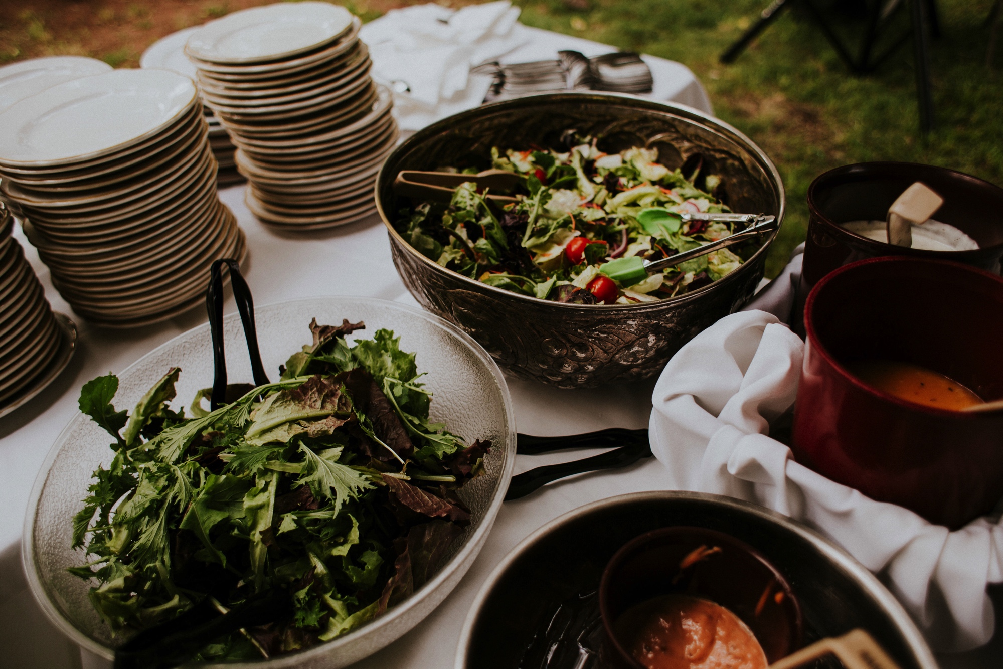  The dress theme for the whole wedding celebration was rainbows - their guests dressed in one color head to toe as part of the theme. The wedding reception at the ranch was near the orchard by the acequia, and was lit by candles and solar lights prim