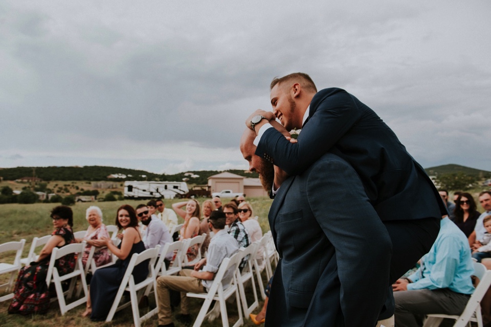  Stephanie and Greg tied the knot on August 18th, 2018 in the backyard of her sister’s house in Sandia Park just outside of Albuquerque, New Mexico. They chose to have their wedding at Stephanie’s sister’s house in the mountains because they love the