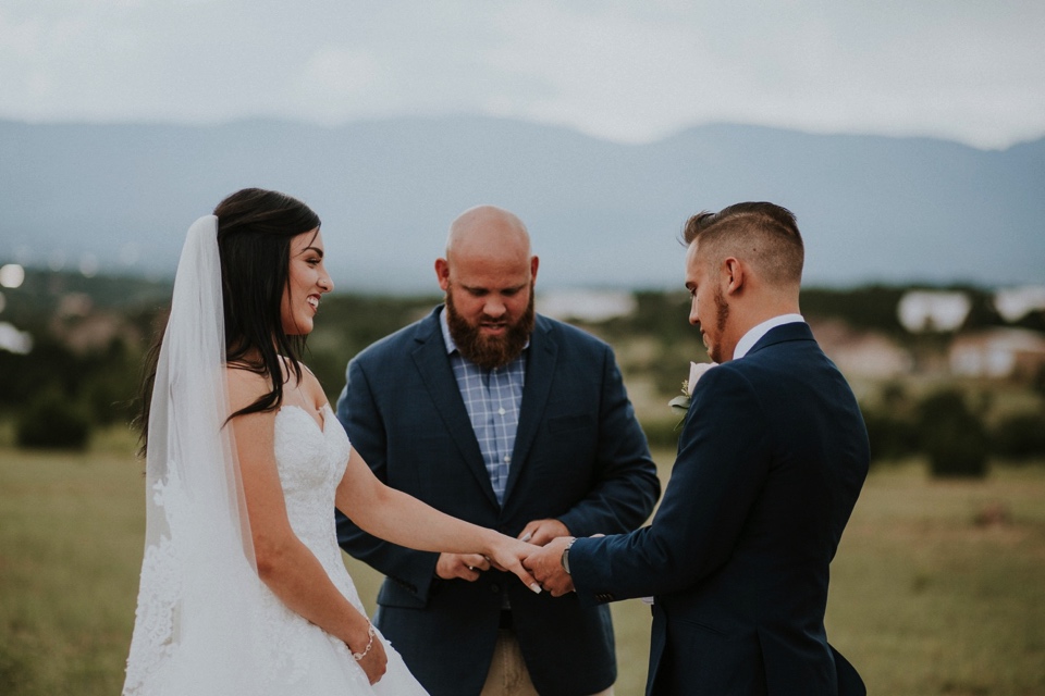  Stephanie and Greg tied the knot on August 18th, 2018 in the backyard of her sister’s house in Sandia Park just outside of Albuquerque, New Mexico. They chose to have their wedding at Stephanie’s sister’s house in the mountains because they love the