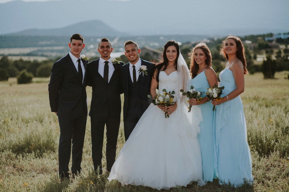  Stephanie and Greg tied the knot on August 18th, 2018 in the backyard of her sister’s house in Sandia Park just outside of Albuquerque, New Mexico. They chose to have their wedding at Stephanie’s sister’s house in the mountains because they love the