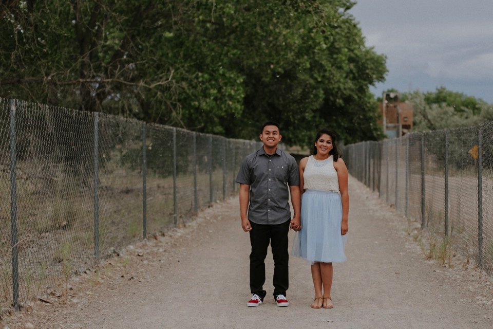  Isamar’s adorable blue tulle skirt complimented Rafael’s outfit perfectly and his red sneakers were the perfect pop of color! Their engagement session was filled with laughter, snuggles, and fun! We were also blessed with a beautiful New Mexico suns