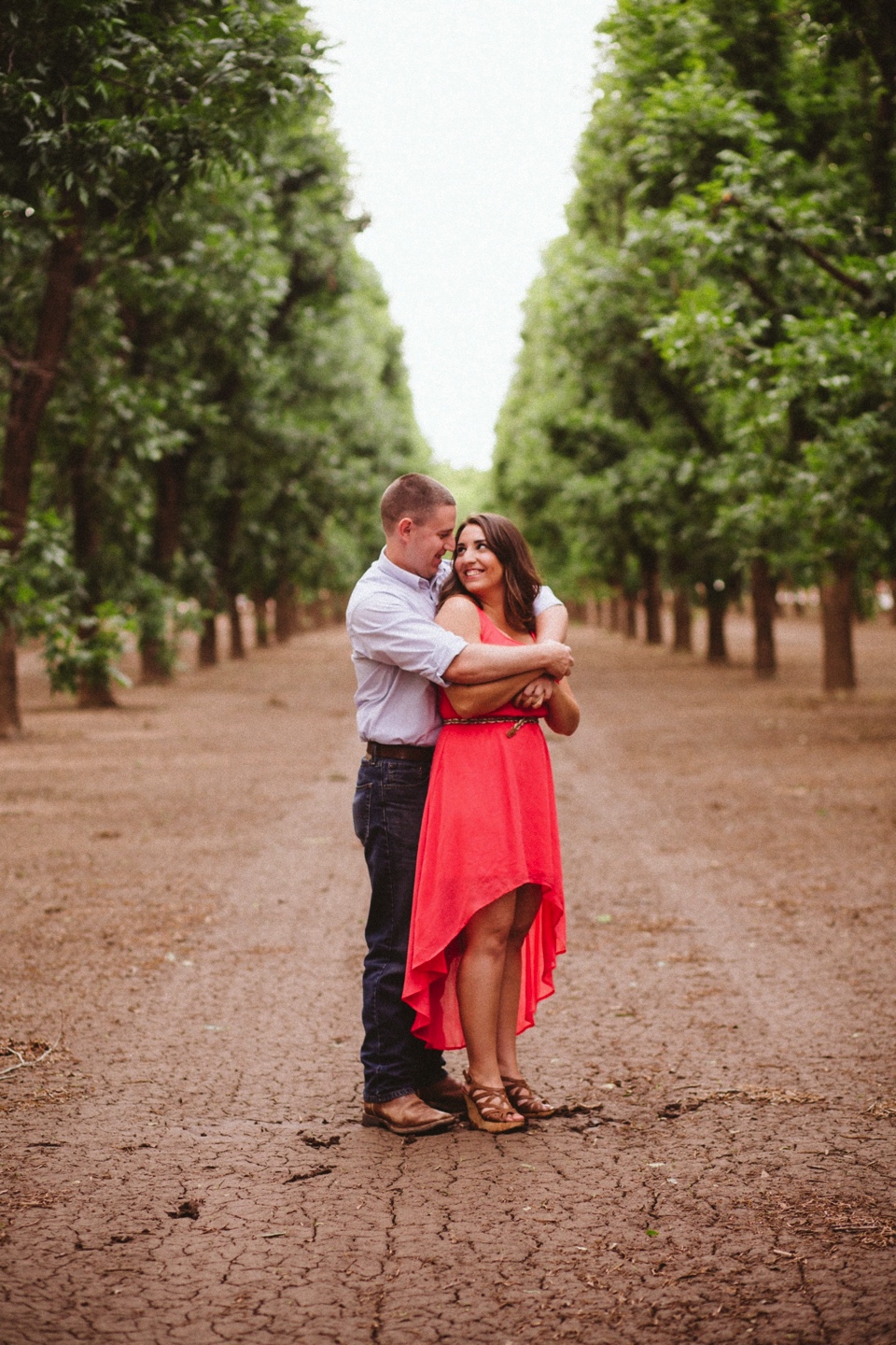  We kicked off their beautiful engagement session at the pecan orchards in Las Cruces, New Mexico. I loved Kristina’s beautiful pink dress and Mitch’s rustic yet classy outfit. Talk about engagement photo inspiration! 