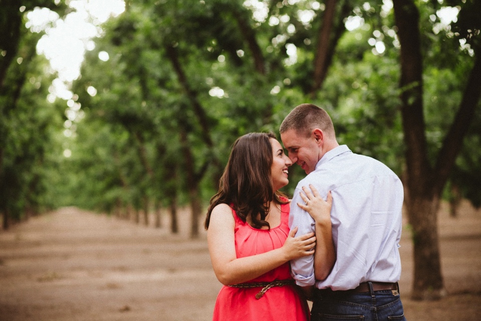  We kicked off their beautiful engagement session at the pecan orchards in Las Cruces, New Mexico. I loved Kristina’s beautiful pink dress and Mitch’s rustic yet classy outfit. Talk about engagement photo inspiration! 