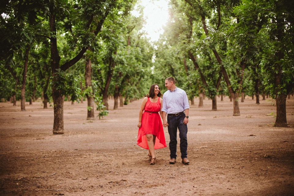  We kicked off their beautiful engagement session at the pecan orchards in Las Cruces, New Mexico. I loved Kristina’s beautiful pink dress and Mitch’s rustic yet classy outfit. Talk about engagement photo inspiration! 