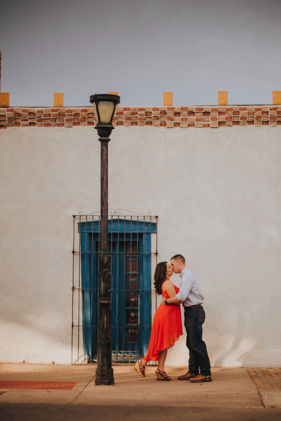  I loved Kristina’s beautiful pink dress and Mitch’s rustic yet classy outfit. Talk about engagement photo inspiration! We then traveled to Mesilla, New Mexico to capture their love fest in the La Plaza de Mesilla as well as in front of the Basilica 