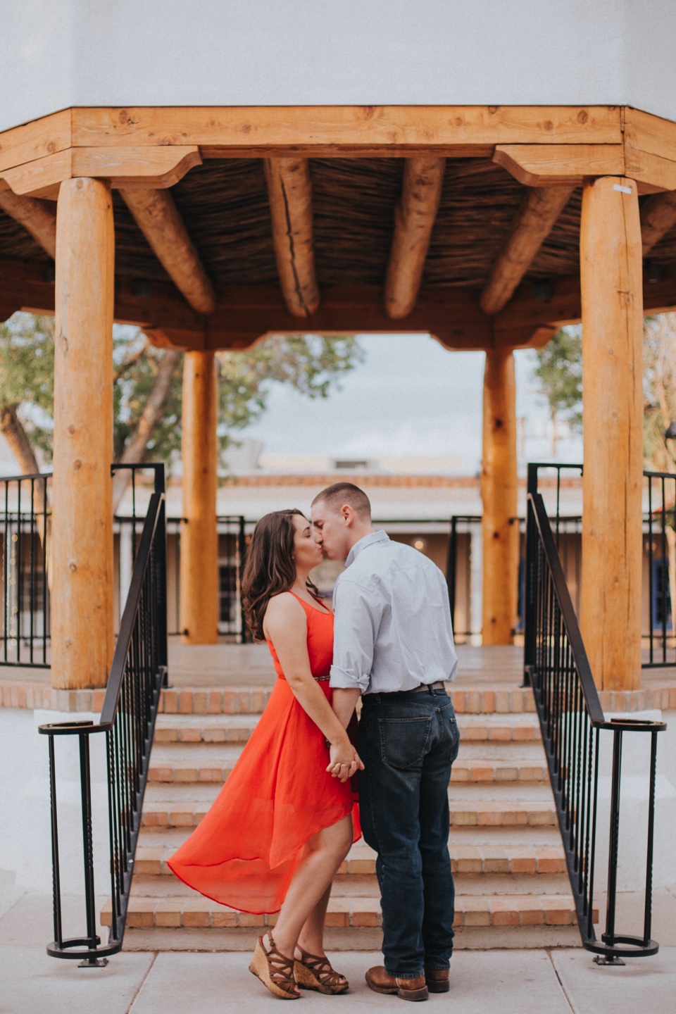  I loved Kristina’s beautiful pink dress and Mitch’s rustic yet classy outfit. Talk about engagement photo inspiration! We then traveled to Mesilla, New Mexico to capture their love fest in the La Plaza de Mesilla as well as in front of the Basilica 