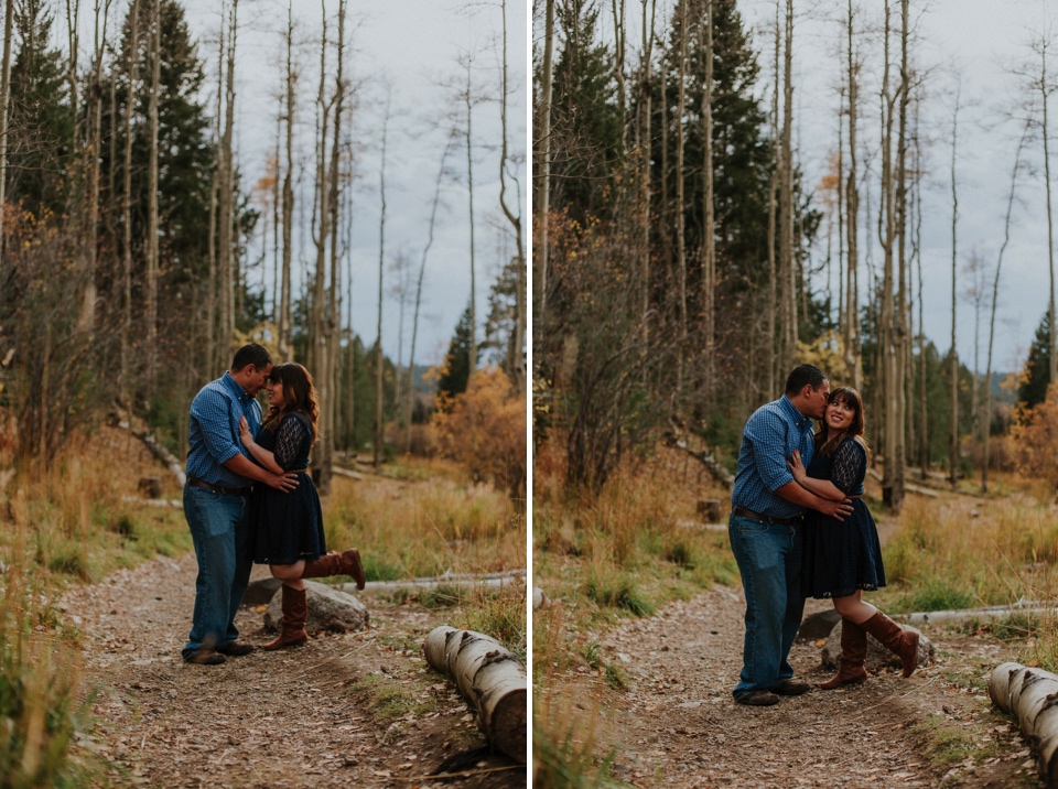  Suzie and Cruz chose the perfect fall engagement outfits for their Santa Fe engagement photos. You can never go wrong with cute brown boots and a blue lace dress! Cruz completed the rustic engagement look with a blue checkered button up and jeans. I