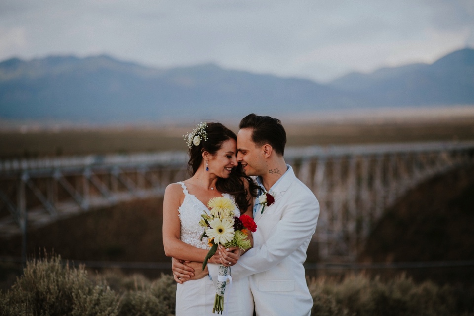  You are going to LOVE these beautiful Rio Grande Gorge Bridge wedding photos from this fabulous Taos elopement! Boris and Jennifer’s sunset elopement was so beautiful, surrounded by their close friends and family that traveled all the way from Vanco