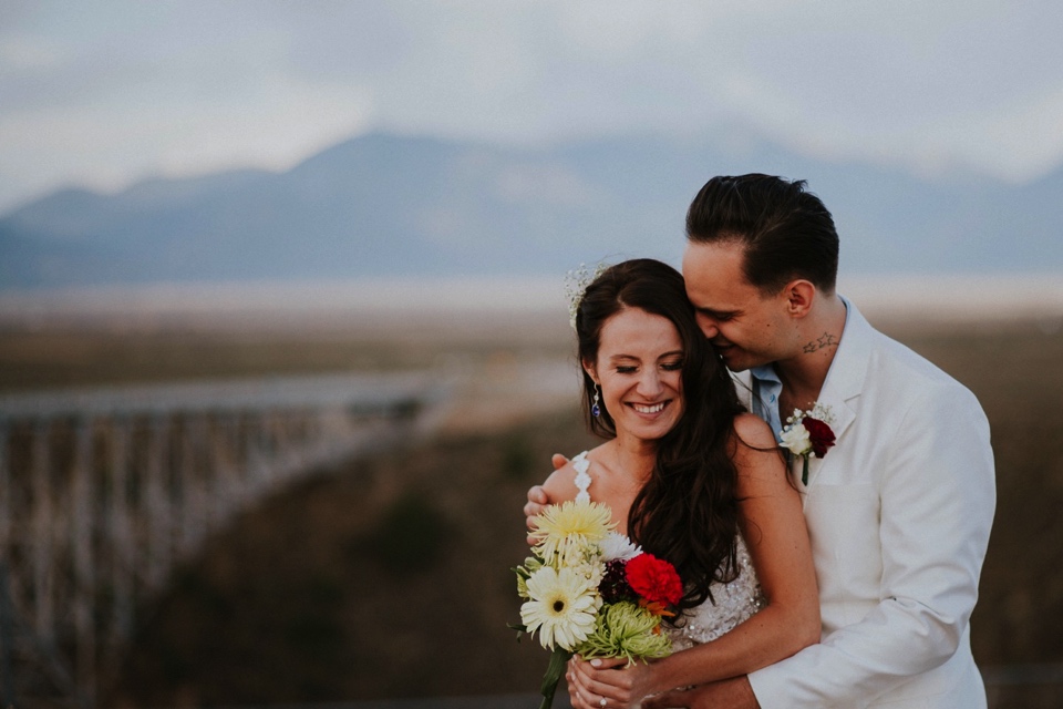  You are going to LOVE these beautiful Rio Grande Gorge Bridge wedding photos from this fabulous Taos elopement! Boris and Jennifer’s sunset elopement was so beautiful, surrounded by their close friends and family that traveled all the way from Vanco