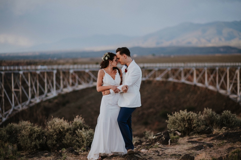  You are going to LOVE these beautiful Rio Grande Gorge Bridge wedding photos from this fabulous Taos elopement! Boris and Jennifer’s sunset elopement was so beautiful, surrounded by their close friends and family that traveled all the way from Vanco