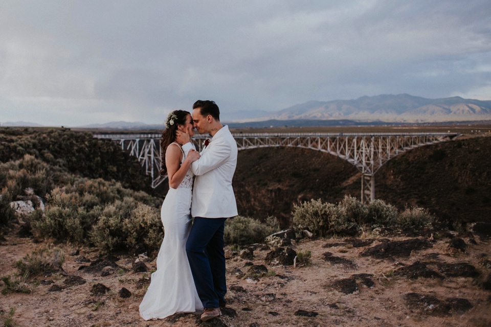  You are going to LOVE these beautiful Rio Grande Gorge Bridge wedding photos from this fabulous Taos elopement! Boris and Jennifer’s sunset elopement was so beautiful, surrounded by their close friends and family that traveled all the way from Vanco