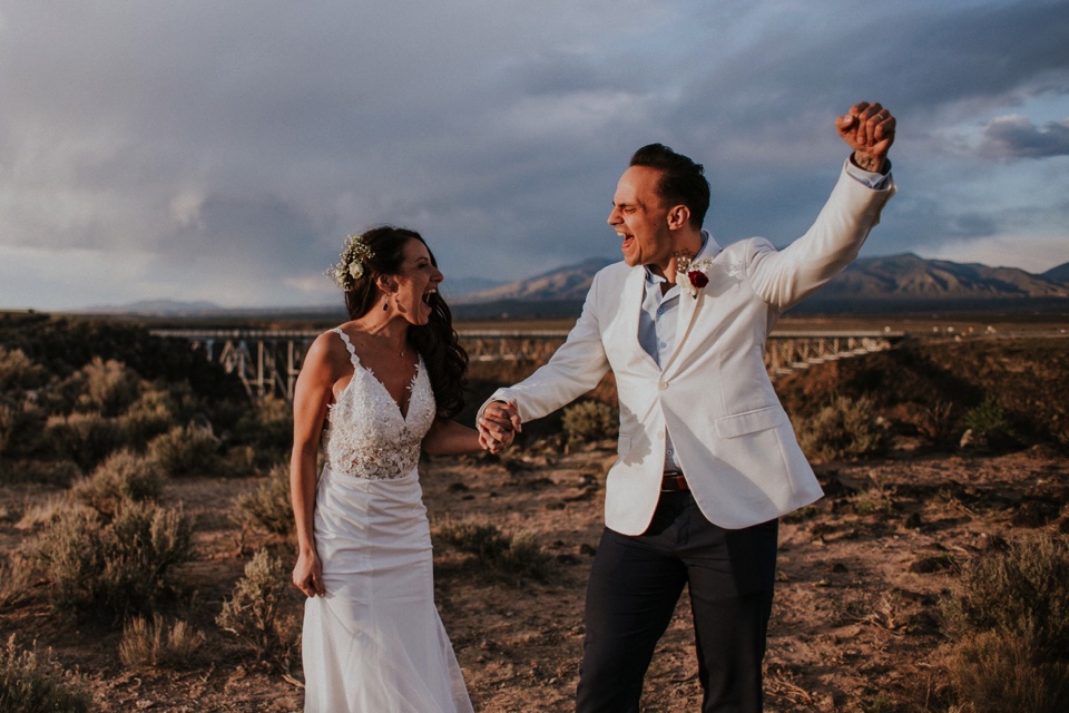  You are going to LOVE these beautiful Rio Grande Gorge Bridge wedding photos from this fabulous Taos elopement! Boris and Jennifer’s sunset elopement was so beautiful, surrounded by their close friends and family that traveled all the way from Vanco