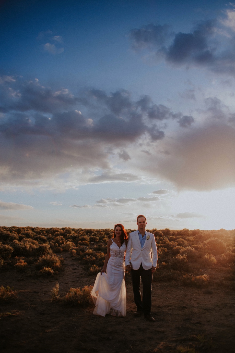  You are going to LOVE these beautiful Rio Grande Gorge Bridge wedding photos from this fabulous Taos elopement! Boris and Jennifer’s sunset elopement was so beautiful, surrounded by their close friends and family that traveled all the way from Vanco