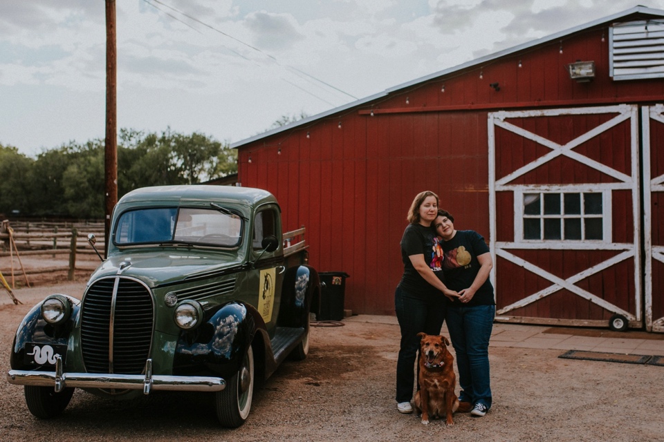  Ryan and Erica’s LGBTQ+ engagement photos at Old Town Farm in Albuquerque, New Mexico are a MUST SEE! Their engagement photos include rocking plaid shirts and converse sneakers, their sweet fur baby, Riley (aka Rileypoo), as well as their love for S