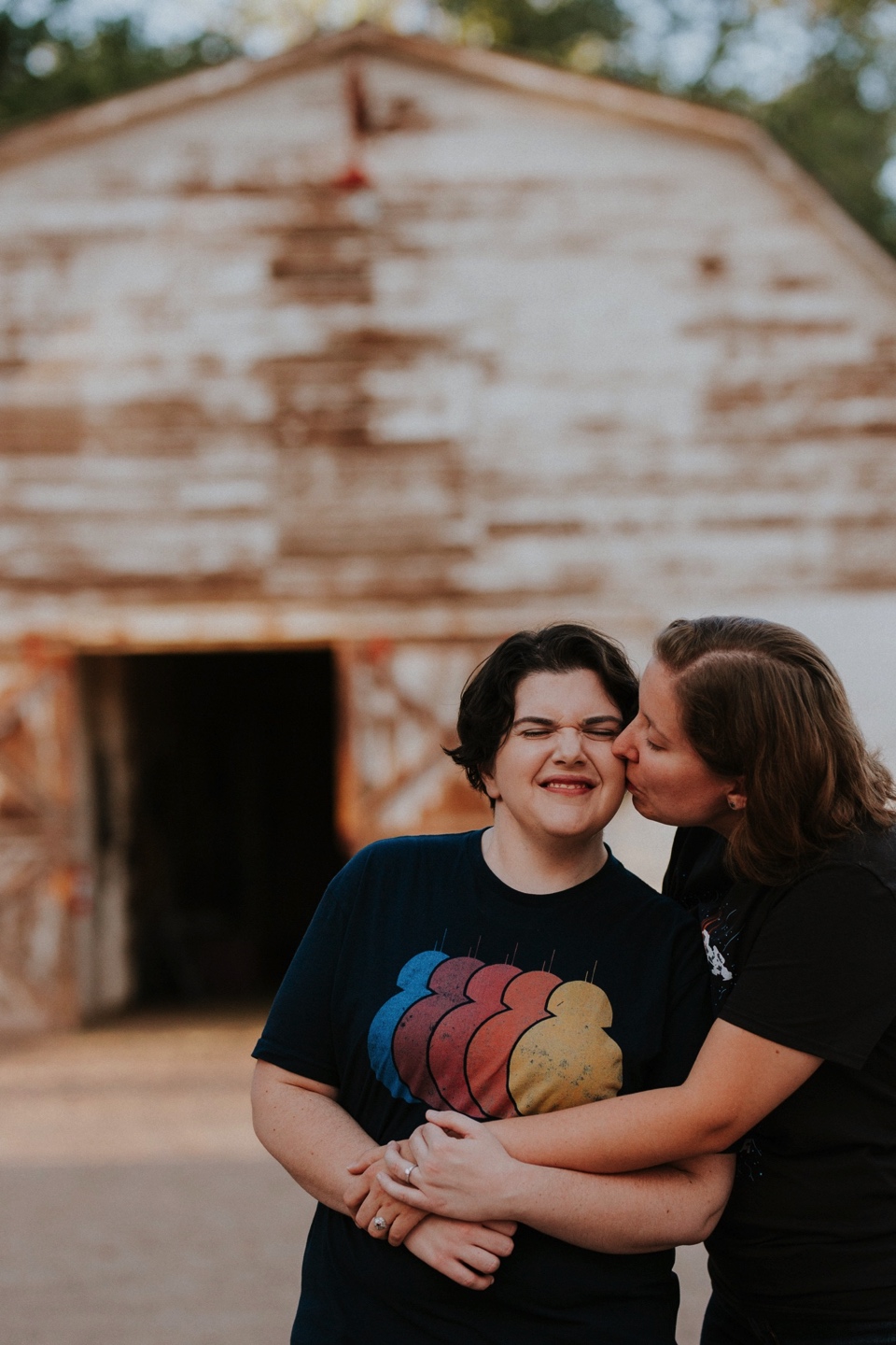  Ryan and Erica’s LGBTQ+ engagement photos at Old Town Farm in Albuquerque, New Mexico are a MUST SEE! Their engagement photos include rocking plaid shirts and converse sneakers, their sweet fur baby, Riley (aka Rileypoo), as well as their love for S