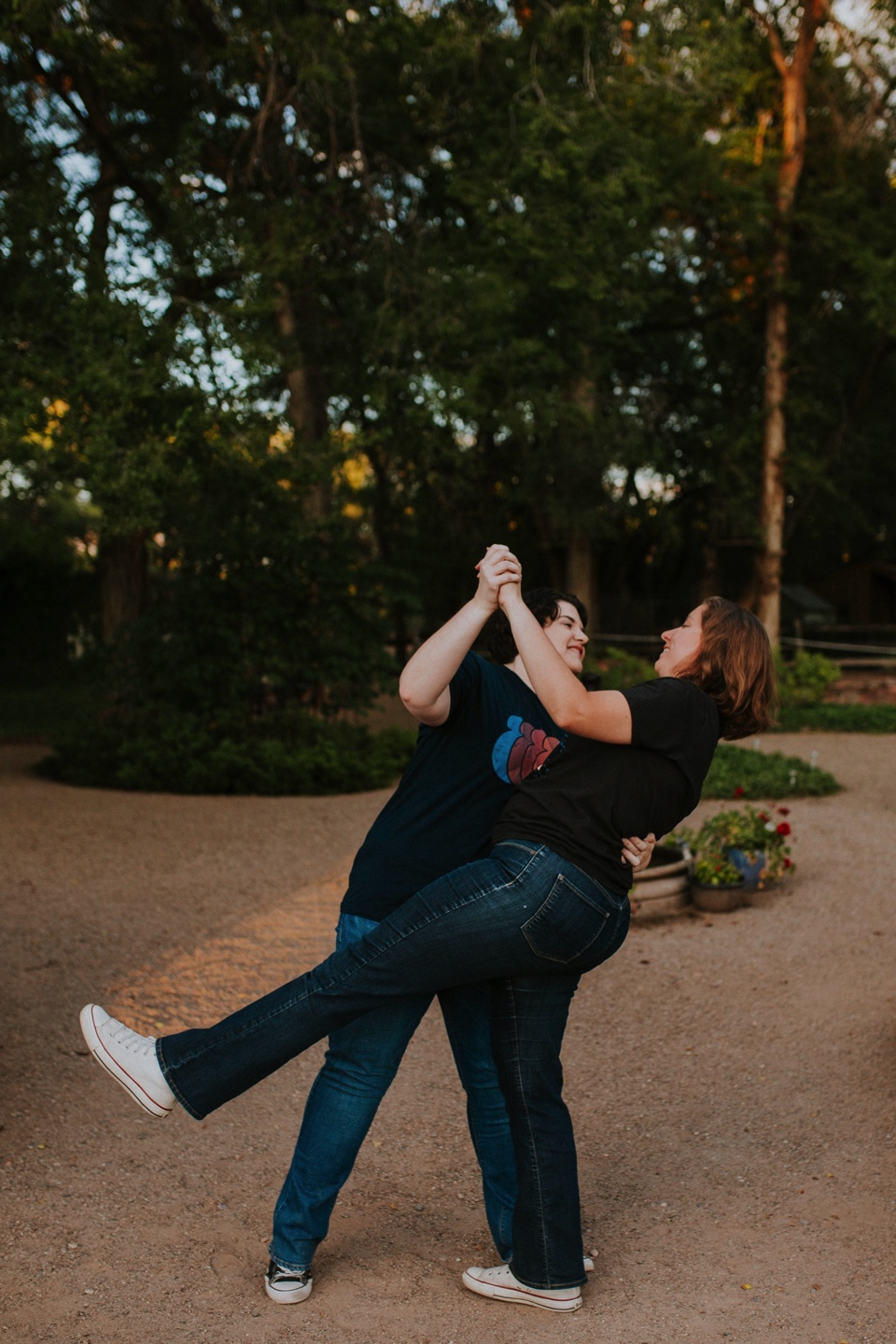  Ryan and Erica’s LGBTQ+ engagement photos at Old Town Farm in Albuquerque, New Mexico are a MUST SEE! Their engagement photos include rocking plaid shirts and converse sneakers, their sweet fur baby, Riley (aka Rileypoo), as well as their love for S