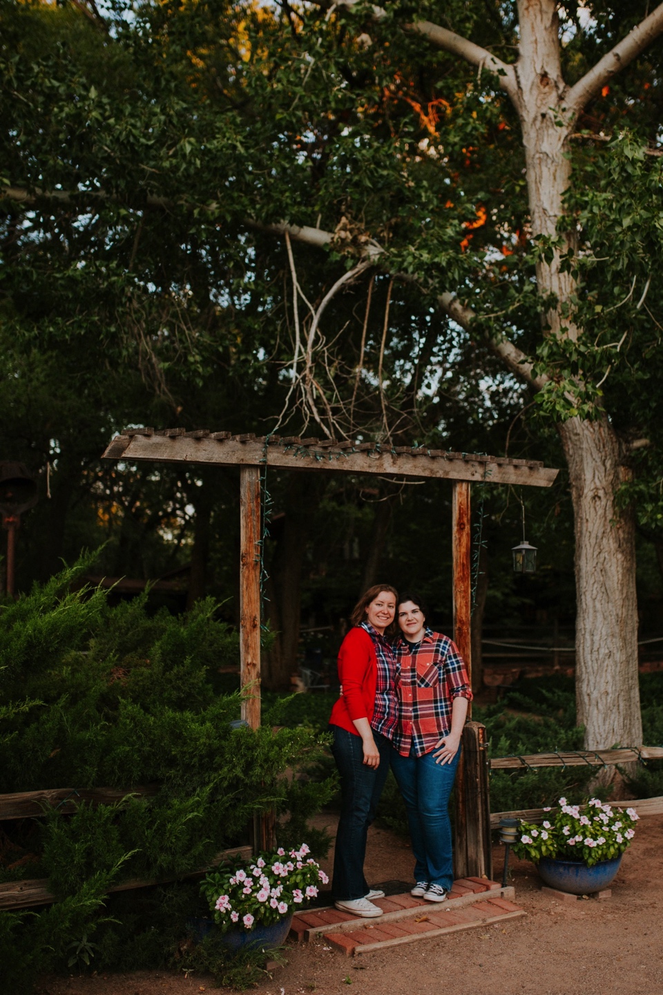  Ryan and Erica’s LGBTQ+ engagement photos at Old Town Farm in Albuquerque, New Mexico are a MUST SEE! Their engagement photos include rocking plaid shirts and converse sneakers, their sweet fur baby, Riley (aka Rileypoo), as well as their love for S