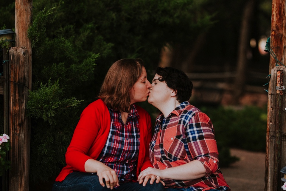  Ryan and Erica’s LGBTQ+ engagement photos at Old Town Farm in Albuquerque, New Mexico are a MUST SEE! Their engagement photos include rocking plaid shirts and converse sneakers, their sweet fur baby, Riley (aka Rileypoo), as well as their love for S