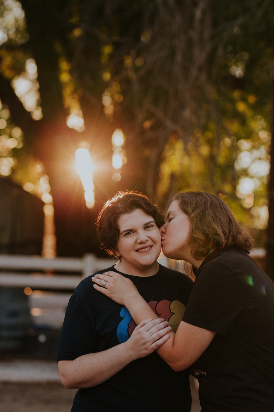  Ryan and Erica’s LGBTQ+ engagement photos at Old Town Farm in Albuquerque, New Mexico are a MUST SEE! Their engagement photos include rocking plaid shirts and converse sneakers, their sweet fur baby, Riley (aka Rileypoo), as well as their love for S