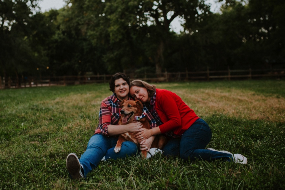  Ryan and Erica’s LGBTQ+ engagement photos at Old Town Farm in Albuquerque, New Mexico are a MUST SEE! Their engagement photos include rocking plaid shirts and converse sneakers, their sweet fur baby, Riley (aka Rileypoo), as well as their love for S