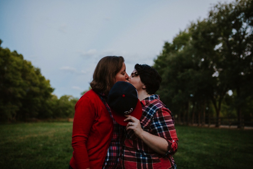  Ryan and Erica’s LGBTQ+ engagement photos at Old Town Farm in Albuquerque, New Mexico are a MUST SEE! Their engagement photos include rocking plaid shirts and converse sneakers, their sweet fur baby, Riley (aka Rileypoo), as well as their love for S