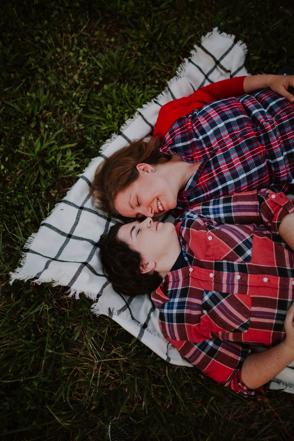  Ryan and Erica’s LGBTQ+ engagement photos at Old Town Farm in Albuquerque, New Mexico are a MUST SEE! Their engagement photos include rocking plaid shirts and converse sneakers, their sweet fur baby, Riley (aka Rileypoo), as well as their love for S