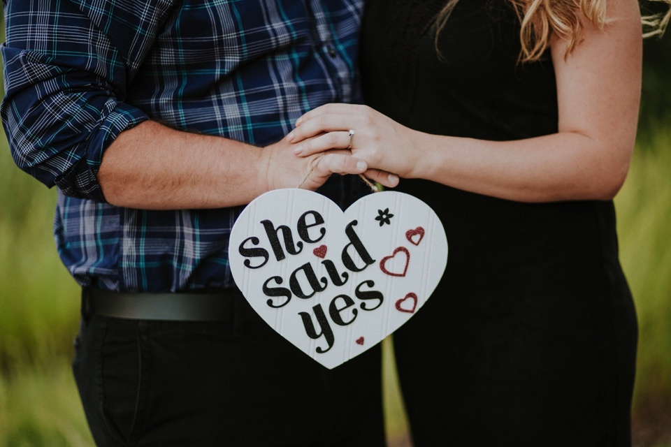  Emily and Ben are the definition of TOTES ADORBS. I love the engagement outfits they chose for their Colorado engagement photos at Cattails Golf Course in Alamosa, Colorado as well as the cute sign and champagne for fun poppin’ bottle photos! The gr