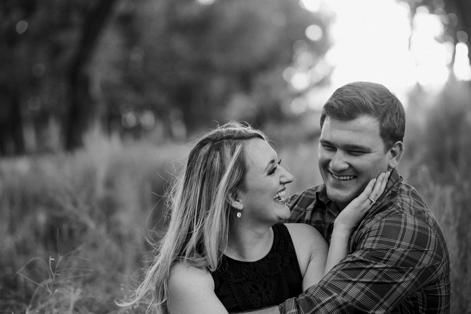  Emily and Ben are the definition of TOTES ADORBS. I love the engagement outfits they chose for their Colorado engagement photos at Cattails Golf Course in Alamosa, Colorado as well as the cute sign and champagne for fun poppin’ bottle photos! The gr