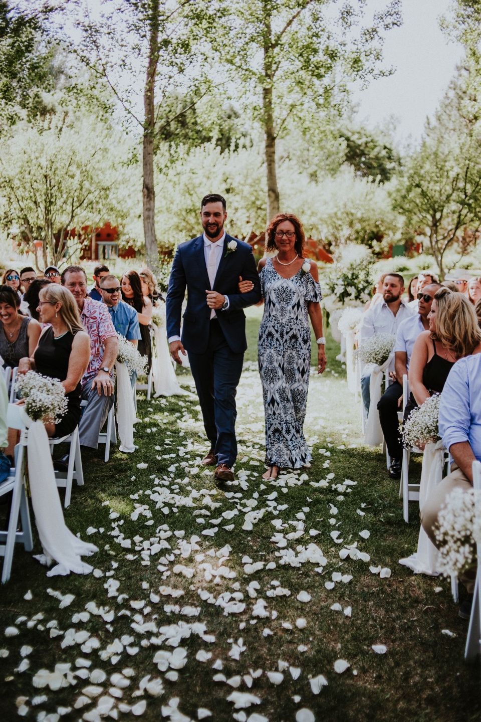  Leslie and Dustin’s gorgeous summer wedding at the ever so amazing El Monte Sagrado in Taos, New Mexico was truly magical. Leslie and Dustin chose El Monte Sagrado in Taos, New Mexico as their wedding venue because from the moment they pulled up in 