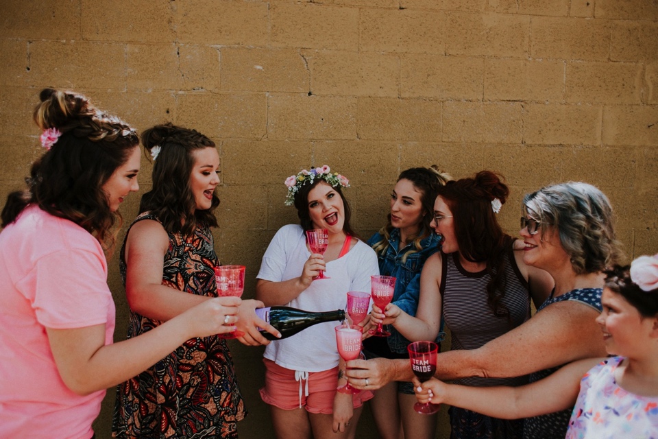 Charlotte and Jayson had a beautiful rustic wedding at the amazing Koinonia Christian Fellowship followed by a dreamy, romantic wedding reception at The View Event Center in Albuquerque, New Mexico. Albuquerque in the summer is gorgeous for weddings