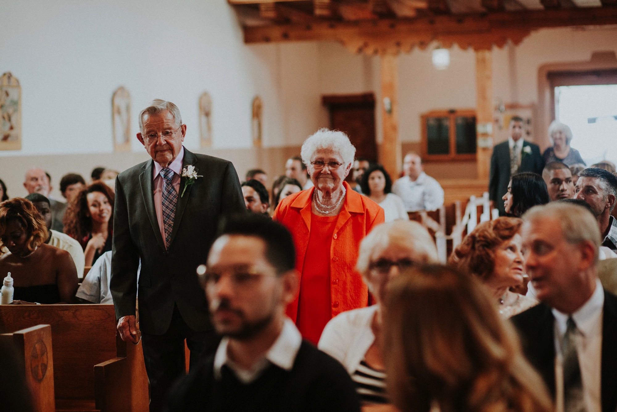  Katie and Frankie’s wedding was what Santa Fe summer wedding dreams are made of! They had a gorgeous catholic wedding ceremony at the Cristo Rey Catholic Church in Santa Fe, New Mexico followed by a fabulous travel-themed wedding reception at La Pos