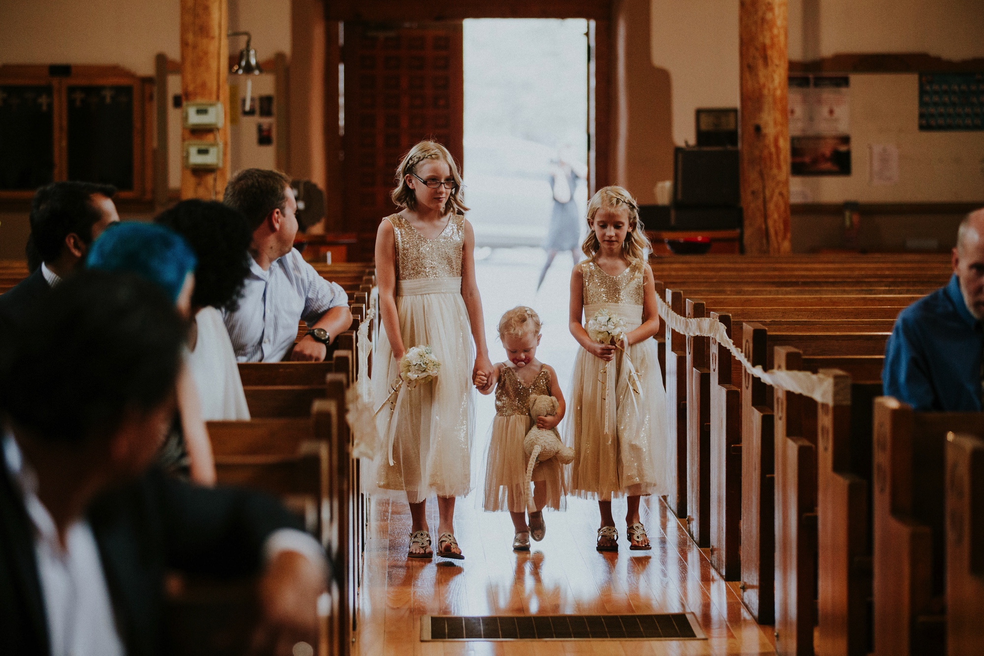  Katie and Frankie’s wedding was what Santa Fe summer wedding dreams are made of! They had a gorgeous catholic wedding ceremony at the Cristo Rey Catholic Church in Santa Fe, New Mexico followed by a fabulous travel-themed wedding reception at La Pos