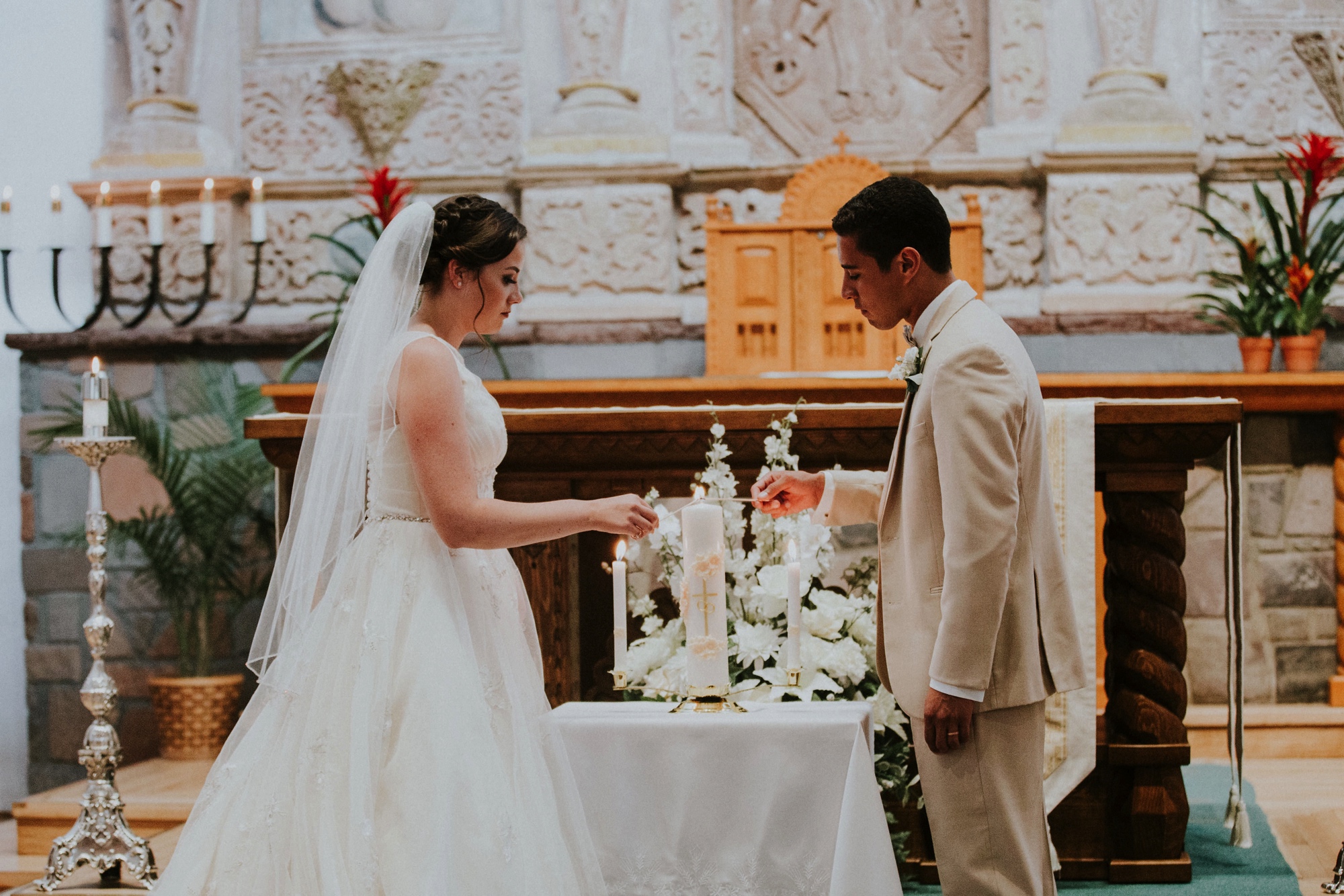  Katie and Frankie’s wedding was what Santa Fe summer wedding dreams are made of! They had a gorgeous catholic wedding ceremony at the Cristo Rey Catholic Church in Santa Fe, New Mexico followed by a fabulous travel-themed wedding reception at La Pos