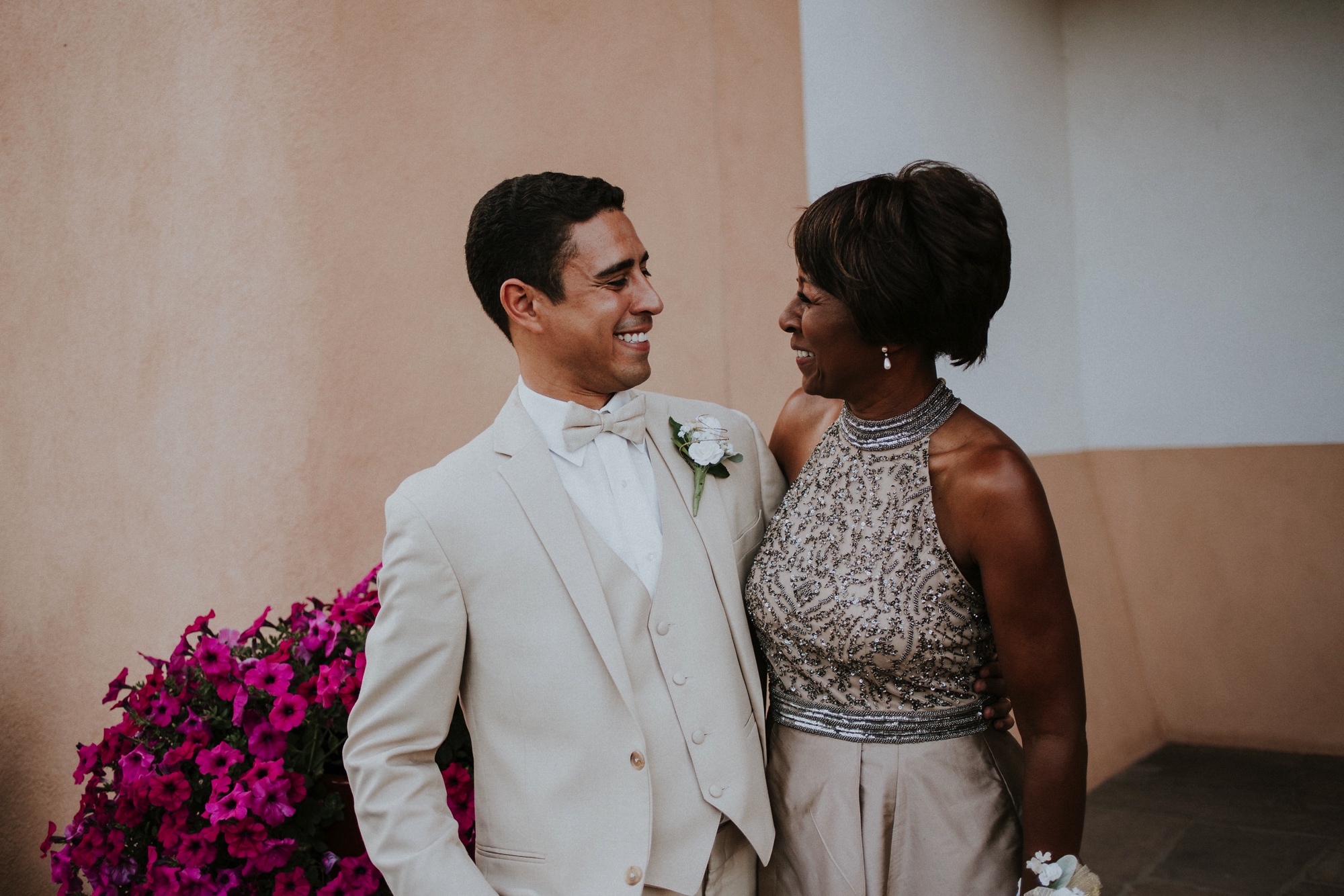  Katie and Frankie’s wedding was what Santa Fe summer wedding dreams are made of! They had a gorgeous catholic wedding ceremony at the Cristo Rey Catholic Church in Santa Fe, New Mexico followed by a fabulous travel-themed wedding reception at La Pos